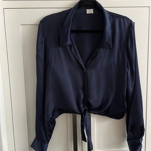 Aritzia tie front blouse new condition. No marks or flaws at all! Size medium